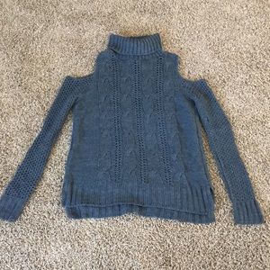 Turtle neck sweater with shoulder cut outs